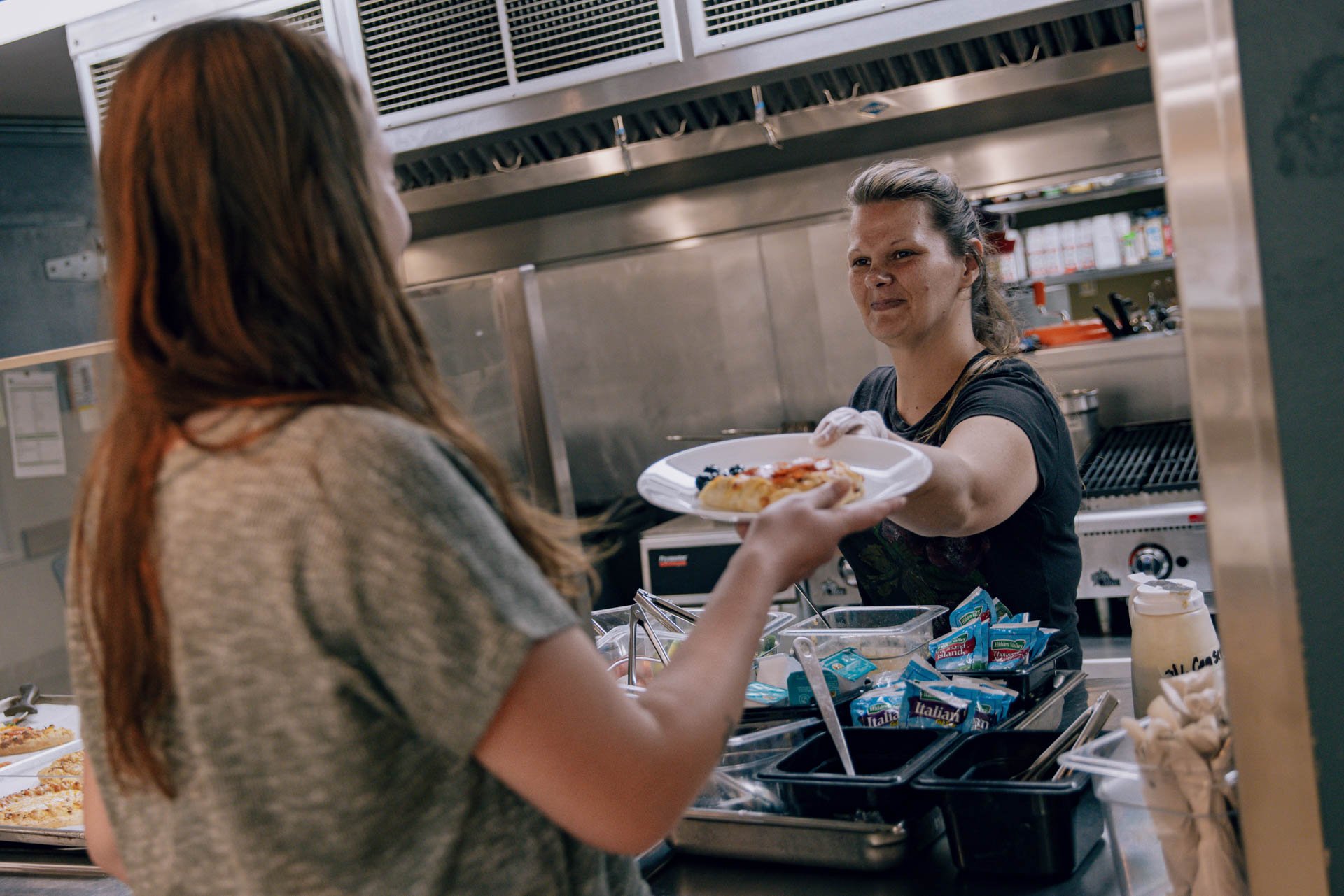 Serving meals at the Womens Shelter